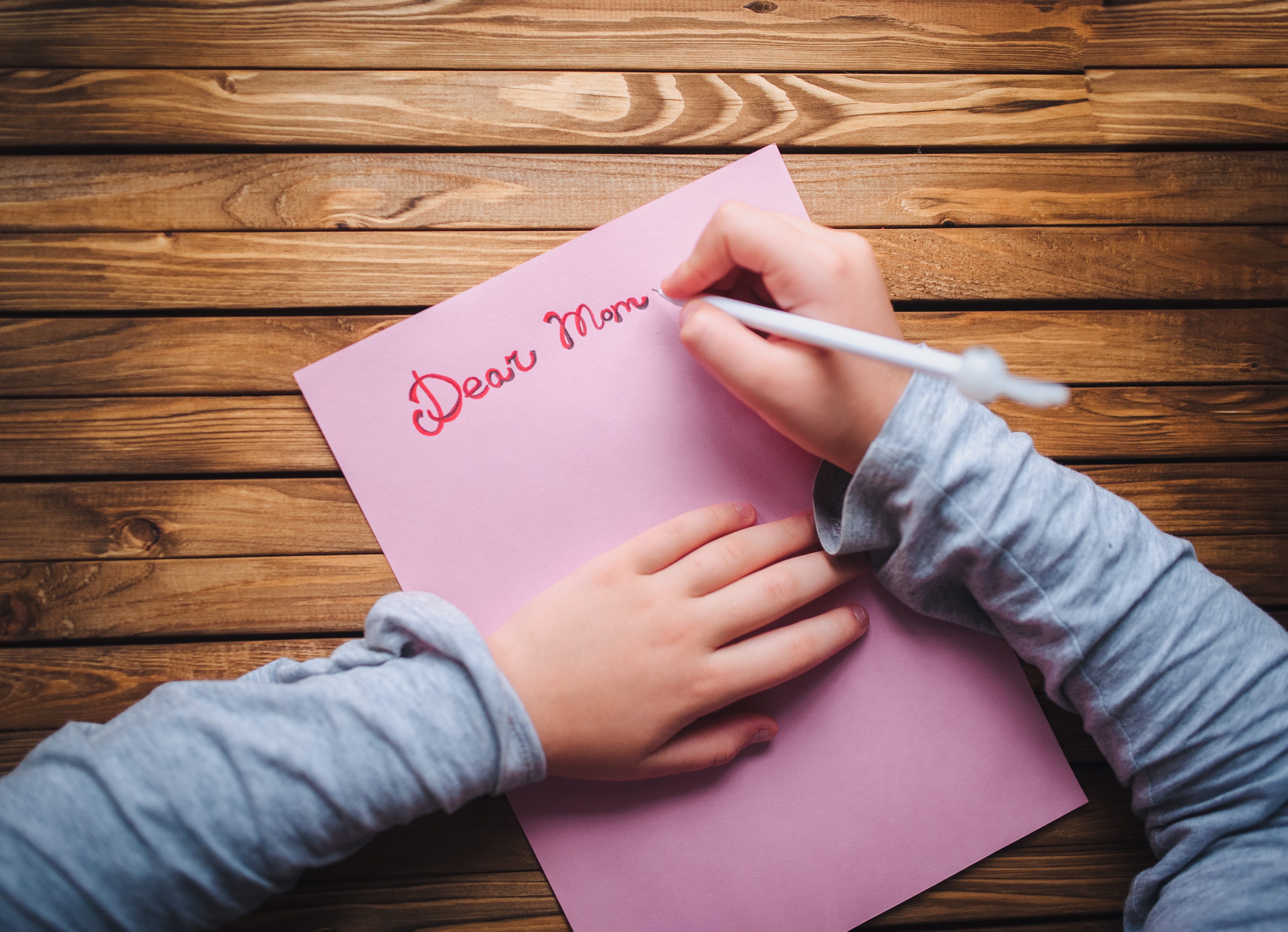 writing a letter to mom