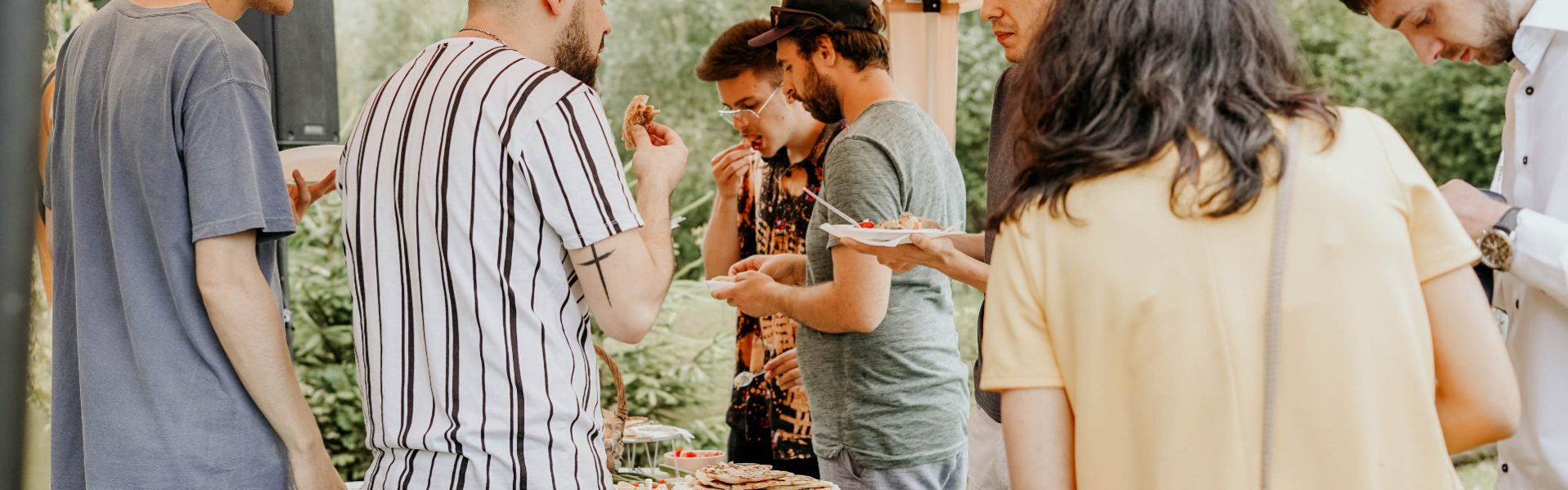 people eating food at an event
