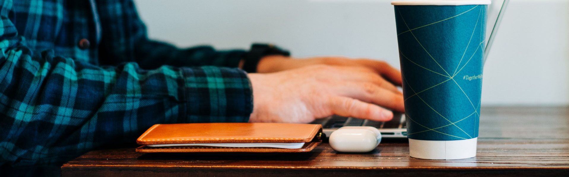 Person typing on keyboard